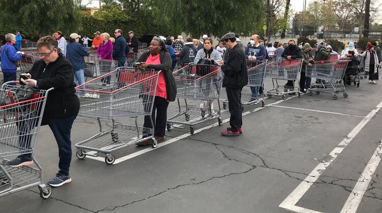 Hundreds of local seniors wait in line as Costco opens up a hour early for them to shop for the first time Tuesday, March 24,2020. Van Nuys CA USA. Costco will be open Tuesdays and Thursday at 8-9am to help the 65 and over people to help them get what they need. Van Nuys USA - ZUMAbl1_ 20200324_zaf_bl1_004 Copyright: xGenexBlevinsx