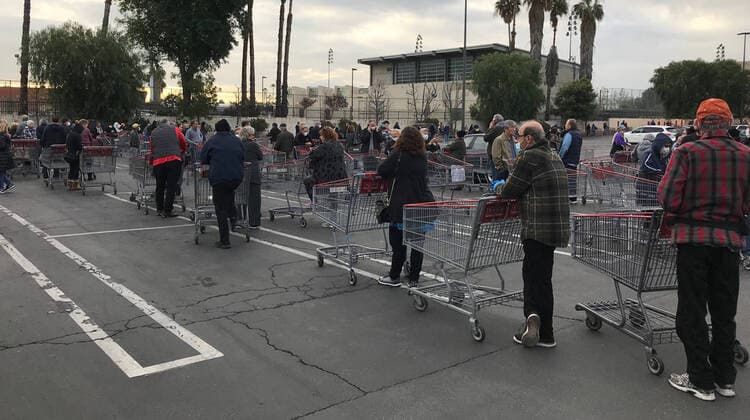 Hundreds of local seniors wait in line as Costco opens up a hour early for them to shop for the first time Tuesday, March 24,2020. Van Nuys CA USA. Costco will be open Tuesdays and Thursday at 8-9am to help the 65 and over people to help them get what they need. Van Nuys USA - ZUMAbl1_ 20200324_zaf_bl1_005 Copyright: xGenexBlevinsx