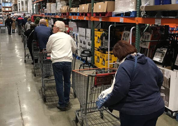Hundreds of local seniors wait in line as Costco opens up a hour early for them to shop for the first time Tuesday, March 24,2020. Van Nuys CA USA. Costco will be open Tuesdays and Thursday at 8-9am to help the 65 and over people to help them get what they need. Van Nuys USA - ZUMAbl1_ 20200324_zaf_bl1_011 Copyright: xGenexBlevinsx