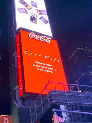 NEW YORK, NY - MARCH 24: A Coca-Cola digital sign promoting social distancing due to the coronavirus pandemic in New York City on March 24, 2020. Copyright: xRainmakerxPhotox