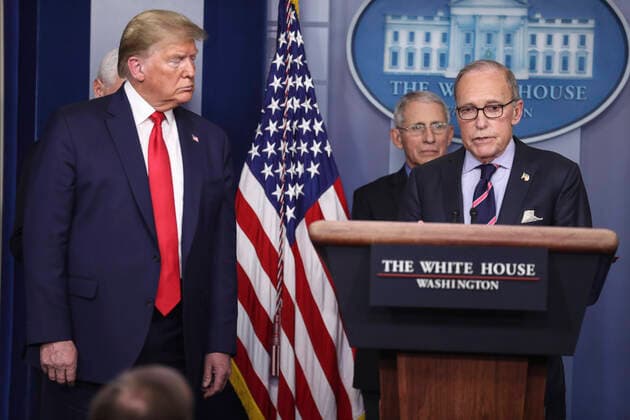 Director of the National Economic Council Larry Kudlow, right, speaks as United States President Donald J Trump, left, listens during a press conference with members of the coronavirus task force in the Brady Press Briefing Room of the White House on March 24, 2020 in Washington, DC. At center is Director of the National Institute of Allergy and Infectious Diseases at the National Institutes of Health Dr. Anthony Fauci. Copyright: xOliverxContrerasx
