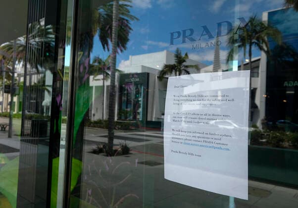 March 24, 2020, Los Angeles, California, U.S: A closed Prada shop in Rodeo Drive in Beverly Hills on Tuesday, March 24, 2020. California Gov. Gavin Newsom issued a statewide stay-at-home order Thursday for residents to venture outside only for essential jobs, errands and some exercise, due to coronavirus concerns. Los Angeles U.S. - ZUMAc68_ 20200324_zaf_c68_013 Copyright: xRingoxChiux