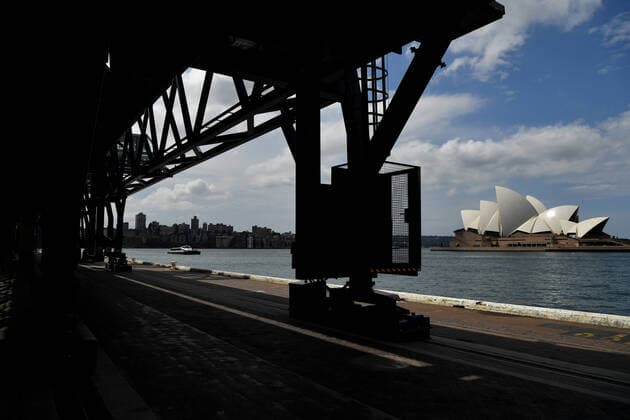 AUSTRALIA CORONAVIRUS COVID-19, The Sydney Opera House seen from an empty Overseas Passenger Terminal at Circular Quay in Sydney, Tuesday, March 24, 2020. A shutdown of non-essential services is in effect Australia wide in a bid to slow the spread of the coronavirus (COVID-19) disease, with the state of NSW recording 818 positive tested cases. ( NO ARCHIVING, EDITORIAL USE ONLY, NO USE IN BOOKS WITHOUT CONSENT SYDNEY NSW AUSTRALIA  Copyright: xJOELxCARRETTx 20200325001459419151