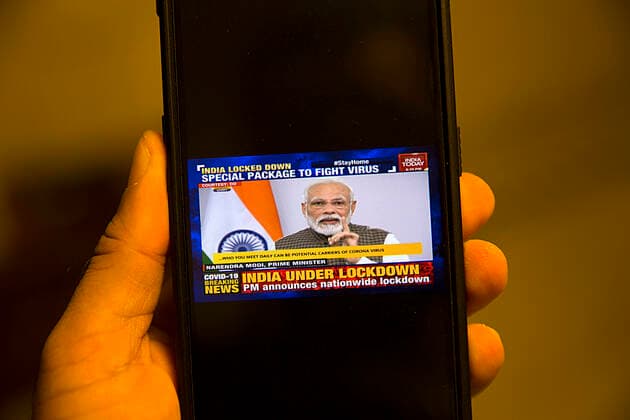 (200325) -- BEIJING, March 25, 2020 -- Photo taken on March 24, 2020 shows Indian Prime Minister Narendra Modi addressing people on television in New Delhi, India. In a bid to fight against the COVID-19 pandemic, Indian Prime Minister Narendra Modi on Tuesday announced a countrywide lockdown for 21 days, beginning Tuesday at 2400 hours. ) XINHUA PHOTOS OF THE DAY JavedxDar 
