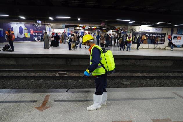 (200325) -- CAIRO, March 25, 2020 -- A man sprays disinfectant in a metro station in Cairo, Egypt on March 24, 2020. Egypt announced on Tuesday that one COVID-19 case died and 36 new cases were detected, bringing the total number of cases in the country to 402. Ahmed Gomaa) EGYPT-CAIRO-METRO-COVID-19-MEASURES WuxHuiwo 