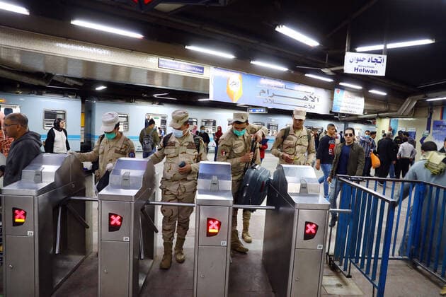 (200325) -- CAIRO, March 25, 2020 -- People are seen in a metro station in Cairo, Egypt on March 24, 2020. Egypt announced on Tuesday that one COVID-19 case died and 36 new cases were detected, bringing the total number of cases in the country to 402. Ahmed Gomaa) EGYPT-CAIRO-METRO-COVID-19-MEASURES WuxHuiwo 