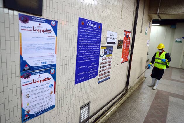 (200325) -- CAIRO, March 25, 2020 -- A man sprays disinfectant in a metro station in Cairo, Egypt on March 24, 2020. Egypt announced on Tuesday that one COVID-19 case died and 36 new cases were detected, bringing the total number of cases in the country to 402. Ahmed Gomaa) EGYPT-CAIRO-METRO-COVID-19-MEASURES WuxHuiwo 