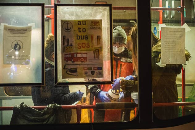 Special SOS Bus in Sopot helps homeless during the coronavirus outbreak Special SOS Bus with a paramedic and some voluntters on the board deliver hot meals and warm clothing to homeless during the coronavirus outbreak on March 24, 2020 in Sopot, Poland. EN_01421673_0016 