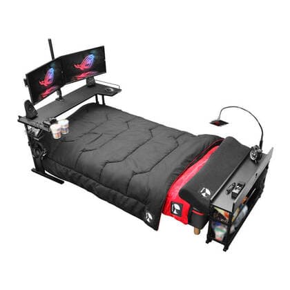 March 25, 2020: A Japanese furniture company have created the perfect coronavirus lockdown set-up with a gaming bed that has room for food and drinks...Video game addicts can now play, eat, drink and nap all without ever leaving their bed...The Ã‚Â£450 gaming bed by Bauhutte means gamers can play non-stop without having to leave for interruptions like eating or sleeping - only the call of nature might lure them away as the bed does not currently feature a bathroom... I wake up and move from my bed to my desk. Why is that so complicated? gaming furniture outfit Bauhutte says in promotions for the bed on its website... Gaming beds solve this problem. ..The bed comes with a desk that can support video screens, an elevating headboard and a headphone hanger...A metallic arm attached to the bed can mount a tablet screen above a person s fa - ZUMAc218 20200325_zia_c218_004 Copyright: xCOVERxImagesx
