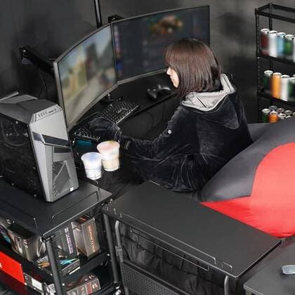 March 25, 2020: A Japanese furniture company have created the perfect coronavirus lockdown set-up with a gaming bed that has room for food and drinks...Video game addicts can now play, eat, drink and nap all without ever leaving their bed...The Ã‚Â£450 gaming bed by Bauhutte means gamers can play non-stop without having to leave for interruptions like eating or sleeping - only the call of nature might lure them away as the bed does not currently feature a bathroom... I wake up and move from my bed to my desk. Why is that so complicated? gaming furniture outfit Bauhutte says in promotions for the bed on its website... Gaming beds solve this problem. ..The bed comes with a desk that can support video screens, an elevating headboard and a headphone hanger...A metallic arm attached to the bed can mount a tablet screen above a person s fa - ZUMAc218 20200325_zia_c218_006 Copyright: xCOVERxImagesx