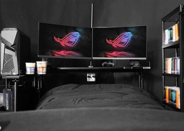 March 25, 2020: A Japanese furniture company have created the perfect coronavirus lockdown set-up with a gaming bed that has room for food and drinks...Video game addicts can now play, eat, drink and nap all without ever leaving their bed...The Ã‚Â£450 gaming bed by Bauhutte means gamers can play non-stop without having to leave for interruptions like eating or sleeping - only the call of nature might lure them away as the bed does not currently feature a bathroom... I wake up and move from my bed to my desk. Why is that so complicated? gaming furniture outfit Bauhutte says in promotions for the bed on its website... Gaming beds solve this problem. ..The bed comes with a desk that can support video screens, an elevating headboard and a headphone hanger...A metallic arm attached to the bed can mount a tablet screen above a person s fa - ZUMAc218 20200325_zia_c218_010 Copyright: xCOVERxImagesx