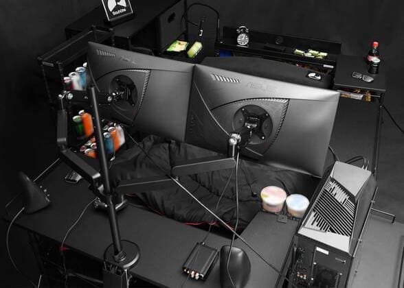 March 25, 2020: A Japanese furniture company have created the perfect coronavirus lockdown set-up with a gaming bed that has room for food and drinks...Video game addicts can now play, eat, drink and nap all without ever leaving their bed...The Ã‚Â£450 gaming bed by Bauhutte means gamers can play non-stop without having to leave for interruptions like eating or sleeping - only the call of nature might lure them away as the bed does not currently feature a bathroom... I wake up and move from my bed to my desk. Why is that so complicated? gaming furniture outfit Bauhutte says in promotions for the bed on its website... Gaming beds solve this problem. ..The bed comes with a desk that can support video screens, an elevating headboard and a headphone hanger...A metallic arm attached to the bed can mount a tablet screen above a person s fa - ZUMAc218 20200325_zia_c218_011 Copyright: xCOVERxImagesx