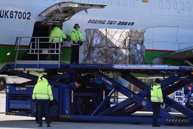 Aircraft landed at the Mosnov - Ostrava airport with supply of medical equipment from China aimed to help tackle the coronavirus epidemic in the Czech Republic, March 25, 2020. (CTKxPhoto JaroslavxOzana) CTKPhotoP202003250297601 JAO 01