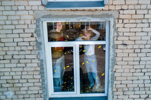 March 24, 2020, Vilnius, Lithuania: ALL PHOTOS WERE TAKEN WITH CONSENT AND WITH PERMISSION TO SHARE IMAGES**..A photographer has used his drone to capture images of people quarantined in their homes during the coronavirus pandemic...The heartwarming photos show how Lithuanian families are spending their time in lockdown, away from the outside world...Photographer Adas Vasiliauskas explained how due the cancellation of his usual advertising photography jobs he decided to make the most of social distancing and show how people are brought together in a time of isolation...Adas explains: At first I thought of offering to shoot people with a telephoto lens, but then I remembered I use a drone in my wedding photography and the drone is a totally zero-human-contact way to capture things. .. I shot a few of my friends, the photos gained a lot - ZUMAc218 20200324_zia_c218_031 Copyright: xCOVERxImagesx