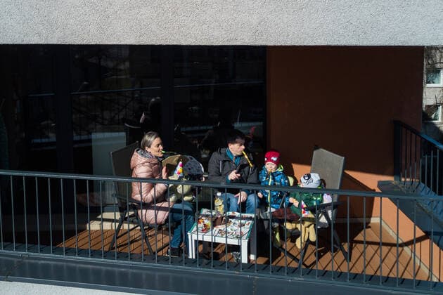 March 24, 2020, Vilnius, Lithuania: ALL PHOTOS WERE TAKEN WITH CONSENT AND WITH PERMISSION TO SHARE IMAGES**..A photographer has used his drone to capture images of people quarantined in their homes during the coronavirus pandemic...The heartwarming photos show how Lithuanian families are spending their time in lockdown, away from the outside world...Photographer Adas Vasiliauskas explained how due the cancellation of his usual advertising photography jobs he decided to make the most of social distancing and show how people are brought together in a time of isolation...Adas explains: At first I thought of offering to shoot people with a telephoto lens, but then I remembered I use a drone in my wedding photography and the drone is a totally zero-human-contact way to capture things. .. I shot a few of my friends, the photos gained a lot - ZUMAc218 20200324_zia_c218_052 Copyright: xCOVERxImagesx