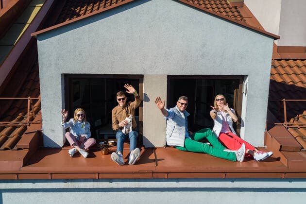 March 24, 2020, Vilnius, Lithuania: ALL PHOTOS WERE TAKEN WITH CONSENT AND WITH PERMISSION TO SHARE IMAGES**..A photographer has used his drone to capture images of people quarantined in their homes during the coronavirus pandemic...The heartwarming photos show how Lithuanian families are spending their time in lockdown, away from the outside world...Photographer Adas Vasiliauskas explained how due the cancellation of his usual advertising photography jobs he decided to make the most of social distancing and show how people are brought together in a time of isolation...Adas explains: At first I thought of offering to shoot people with a telephoto lens, but then I remembered I use a drone in my wedding photography and the drone is a totally zero-human-contact way to capture things. .. I shot a few of my friends, the photos gained a lot - ZUMAc218 20200324_zia_c218_032 Copyright: xCOVERxImagesx