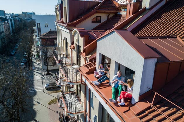 March 24, 2020, Vilnius, Lithuania: ALL PHOTOS WERE TAKEN WITH CONSENT AND WITH PERMISSION TO SHARE IMAGES**..A photographer has used his drone to capture images of people quarantined in their homes during the coronavirus pandemic...The heartwarming photos show how Lithuanian families are spending their time in lockdown, away from the outside world...Photographer Adas Vasiliauskas explained how due the cancellation of his usual advertising photography jobs he decided to make the most of social distancing and show how people are brought together in a time of isolation...Adas explains: At first I thought of offering to shoot people with a telephoto lens, but then I remembered I use a drone in my wedding photography and the drone is a totally zero-human-contact way to capture things. .. I shot a few of my friends, the photos gained a lot - ZUMAc218 20200324_zia_c218_033 Copyright: xCOVERxImagesx