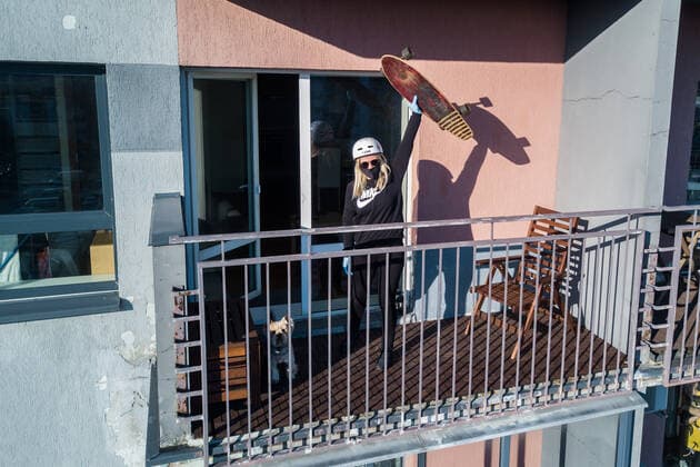 March 24, 2020, Vilnius, Lithuania: ALL PHOTOS WERE TAKEN WITH CONSENT AND WITH PERMISSION TO SHARE IMAGES**..A photographer has used his drone to capture images of people quarantined in their homes during the coronavirus pandemic...The heartwarming photos show how Lithuanian families are spending their time in lockdown, away from the outside world...Photographer Adas Vasiliauskas explained how due the cancellation of his usual advertising photography jobs he decided to make the most of social distancing and show how people are brought together in a time of isolation...Adas explains: At first I thought of offering to shoot people with a telephoto lens, but then I remembered I use a drone in my wedding photography and the drone is a totally zero-human-contact way to capture things. .. I shot a few of my friends, the photos gained a lot - ZUMAc218 20200324_zia_c218_035 Copyright: xCOVERxImagesx