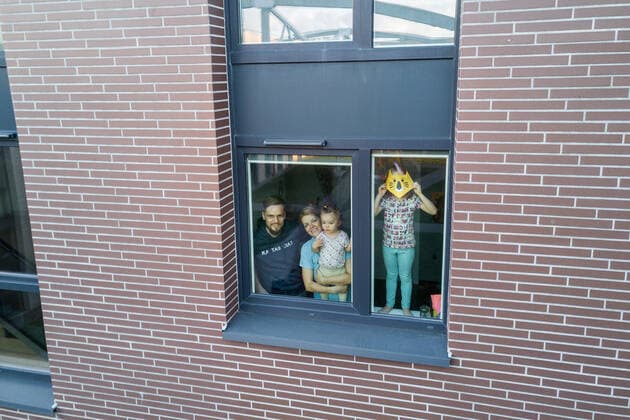 March 24, 2020, Vilnius, Lithuania: ALL PHOTOS WERE TAKEN WITH CONSENT AND WITH PERMISSION TO SHARE IMAGES**..A photographer has used his drone to capture images of people quarantined in their homes during the coronavirus pandemic...The heartwarming photos show how Lithuanian families are spending their time in lockdown, away from the outside world...Photographer Adas Vasiliauskas explained how due the cancellation of his usual advertising photography jobs he decided to make the most of social distancing and show how people are brought together in a time of isolation...Adas explains: At first I thought of offering to shoot people with a telephoto lens, but then I remembered I use a drone in my wedding photography and the drone is a totally zero-human-contact way to capture things. .. I shot a few of my friends, the photos gained a lot - ZUMAc218 20200324_zia_c218_043 Copyright: xCOVERxImagesx