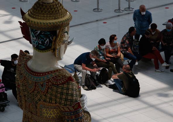 March 25, 2020, Bangkok, Thailand: Tourists wait to checks in at the departures hall at Bangkok s Suvarnabhumi Airport. Bangkok Thailand - ZUMAs197 20200325_zaa_s197_068 Copyright: xChaiwatxSubprasomx