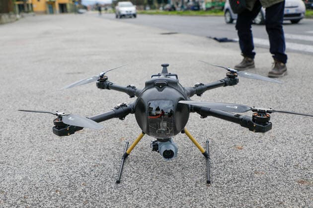March 25, 2020, Naples, CAMPANIA, ITALY: 03 25 2020 Naples, Scampia district, the carabinieri and the helicopters department of Pontecagnano have presented the new drones that will serve for the control of the gatherings by citizens during the quarantine for the emergency from covid-19 virus Naples ITALY - ZUMAs236 20200325_zap_s236_015 Copyright: xFabioxSassox