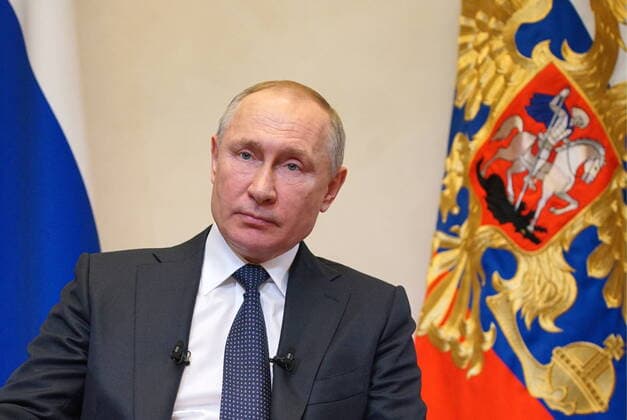 MOSCOW REGION, RUSSIA - MARCH 25, 2020: Russia s President Vladimir Putin addresses Russian citizens on the COVID-19 coronavirus situation at Novo-Ogaryovo residence. Alexei Druzhinin Russian Presidential Press and Information Office TASS  TS0D3569