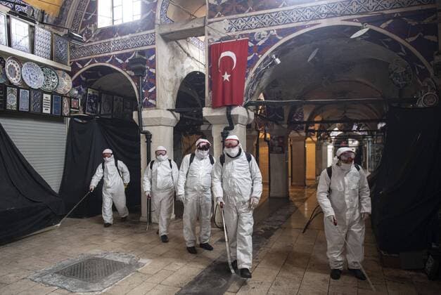 Staff members disinfect historical Grand Bazaar, in Istanbul, Turkey, on March 25, 2020. Turkey has confirmed 44 death and 1,874 positive cases of the coronavirus infection in the country. (Akin Celiktas- Depo Photos) Copyright: AkinxCeliktasx-xDepoxPhotos 16705217
