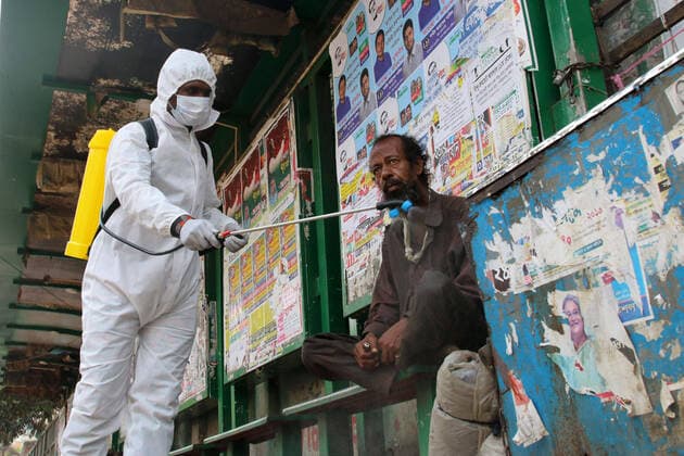 News Themen der Woche KW13 News Bilder des Tages March 26, 2020, Dhaka, Bangladesh: A Fire bridge member wearing a protective suite sprays disinfectant on a wall amid concerns about the spread of coronavirus disease (COVID-19) in Dhaka..Death toll raised to 5 and 39 people were reported infected by COVID-19 in Bangladesh. Dhaka Bangladesh - ZUMAs197 20200326_zaa_s197_013 Copyright: xSultanxMahmudxMukutx