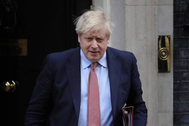 (200325) -- LONDON, March 25, 2020 (Xinhua) -- British Prime Minster Boris Johnson leaves 10 Downing Street for Prime Minister s Questions, in London, Britain, March 25, 2020. (Photo by Tim Ireland Xinhua) BRITAIN-LONDON-PMQ 