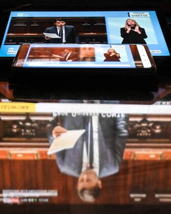 The italian Prime Minister Giuseppe Conte is seen on television, tablet and mobile phone, during his speech at the the lower chamber about the measures taken to counter the spread of the Coronavirus in Italy . Roma 25 03 2020 Photo Andrea Staccioli Insidefoto andreaxstaccioli