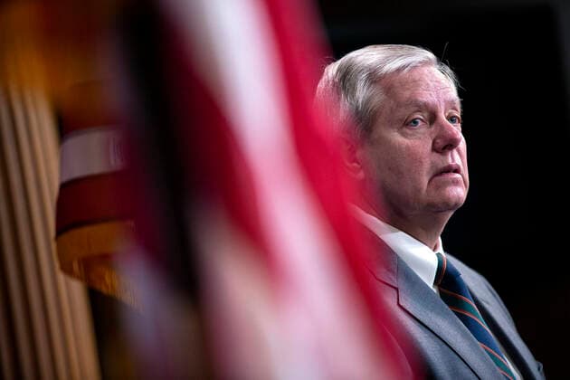 United States Senator Lindsey Graham (Republican of South Carolina) listens during a news conference with United States Senator Tim Scott (Republican of South Carolina), United States Senator Rick Scott (Republican of Florida), and United States Senator Ben Sasse (Republican of Nebraska) at the United States Capitol in Washington D.C., U.S. on Wednesday, March 25, 2020. The Senators are calling for a correction to a supposed drafting error in the Coronavirus Stimulus Package that the Senate was set to vote on today, stating it incentivizes unemployment. Copyright: xStefanixReynoldsx
