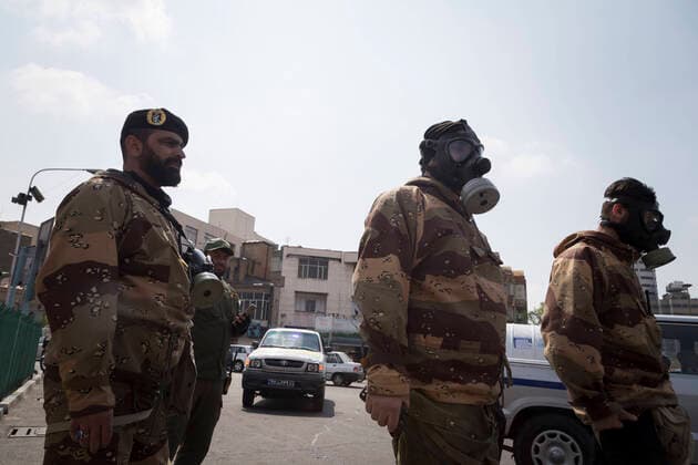 March 25, 2020, Tehran, Iran: Iran s Revolutionary Guard Corps carry out disinfection works as a preventive measure against the coronavirus (Covid-19) pandemic as part of the biological defense drill, launched in coordination with the National Headquarters For Fighting The Coronavirus, in 100 different points in Tehran, Iran. Iran launched the 3-day biological defense drill at 3,000 locations across the country. A total of 143 people in Iran have died of coronavirus over the last 24 hours, pushing the death toll up to 2,077, said Iranian health authorities on Wednesday. Italy, China, Iran, and Spain continue to be the most affected countries. Tehran Iran - ZUMAf146 20200325_zip_f146_033 Copyright: xRouzbehxFouladix