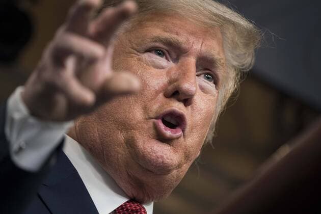 President Donald Trump delivers remarks on the COVID-19 (Coronavirus) pandemic alongside members of the Coronavirus Task Force in the Brady Press Briefing Room at the White House in Washington, DC, March 25, 2020, in Washington, D.C.  WAP20200325265 SARAHxSILBIGER