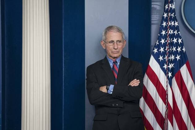 Dr. Anthony Fauci, director of the National Institute of Allergy and Infectious Diseases listens as President Donald Trump delivers remarks on the COVID-19 (Coronavirus) pandemic alongside members of the Coronavirus Task Force in the Brady Press Briefing Room at the White House in Washington, DC, March 25, 2020, in Washington, D.C.  WAP20200325289 SARAHxSILBIGER