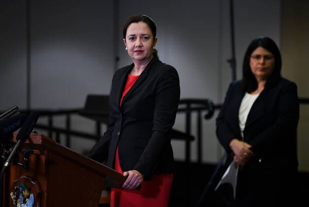 QUEENSLAND SCHOOLS COVID-19 PRESSER, Queensland Premier Annastacia Palaszczuk (left) and Minister for Education Grace Grace are seen during a press conference at Parliament House in Brisbane, Thursday, March 26, 2020. They have announced that Queensland schools will be student-free from next week due to the coronavirus COVID-19 pandemic. ( NO ARCHIVING, EDITORIAL USE ONLY, NO USE IN BOOKS WITHOUT CONSENT BRISBANE QUEENSLAND AUSTRALIA  Copyright: xDANxPELEDx 20200326001460010747