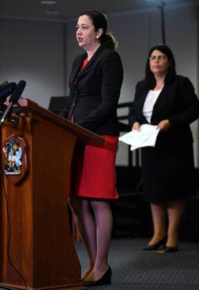QUEENSLAND SCHOOLS COVID-19 PRESSER, Queensland Premier Annastacia Palaszczuk (left) and Minister for Education Grace Grace are seen during a press conference at Parliament House in Brisbane, Thursday, March 26, 2020. They have announced that Queensland schools will be student-free from next week due to the coronavirus COVID-19 pandemic. ( NO ARCHIVING, EDITORIAL USE ONLY, NO USE IN BOOKS WITHOUT CONSENT BRISBANE QUEENSLAND AUSTRALIA  Copyright: xDANxPELEDx 20200326001460014582
