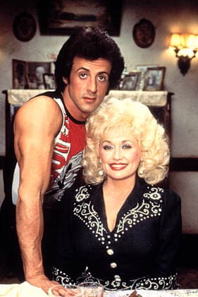 RHINESTONE, Sylvester Stallone, Dolly Parton, 1984, TM and Copyright (c)20th Century Fox Film Corp. All rights reserved. 20thCentFox Courtesy Everett Collection !ACHTUNG AUFNAHMEDATUM GESCHÃ„TZT! PUBLICATIONXNOTxINxCANxCHNxFRAxITAxJPNxNORxPOLxRUSxESPxUKxUSA Copyright: x20thCentFox CourtesyxEverettxCollectionx MSDRHIN FE003