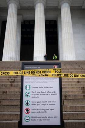 (200326) -- WASHINGTON D.C., March 26, 2020 -- A guidance board about measures of prevention of COVID-19 is seen in front of the closed Lincoln Memorial in Washington D.C., the United States, March 25, 2020. The number of COVID-19 cases in the United States topped 60,000 as of 3:30 p.m. U.S. Eastern Time on Wednesday (1930 GMT), according to the Center for Systems Science and Engineering (CSSE) at Johns Hopkins University. ) U.S.-WASHINGTON D.C.-COVID-19 LiuxJie 