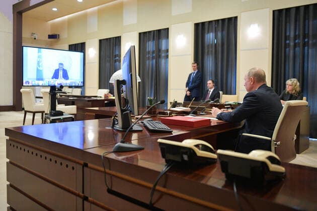 MOSCOW REGION, RUSSIA - MARCH 26, 2020: Russia s President Vladimir Putin (R) takes part in an extraordinary G20 Summit via a video link. The summit is dedicated to the COVID-19 coronavirus pandemic and is held online for the first time. Alexei Druzhinin Russian Presidential Press and Information Office TASS  TS0D3688