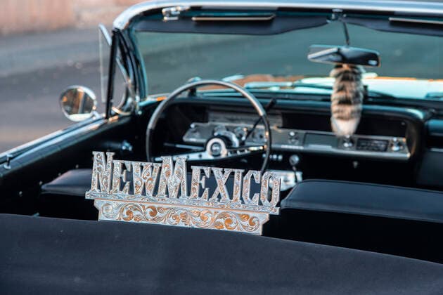 Detail of a shiny New Mexico sign affixed to a vintage car, in Old town, Albuquerque, New Mexico, United States of America, North America Copyright: ShannaxBaker 1315-205 Editorial Use Only