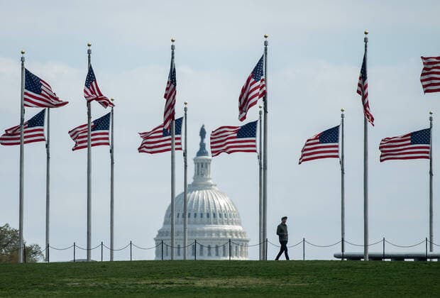 The U.S. Capitol Building is seen after the Senate passed a nearly $2 trillion economic stimulus package, the largest ever, to help ease the economic downturn following the Coronavirus pandemic sweeping the nation, in Washington, D.C on Thursday, March 26, 2020.  WAP20200326321 KEVINxDIETSCH