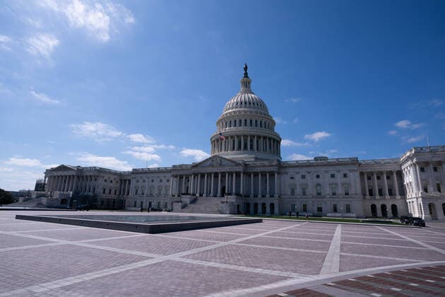 The U.S. Capitol Building is seen after the Senate passed a nearly $2 trillion economic stimulus package, the largest ever, to help ease the economic downturn following the Coronavirus pandemic sweeping the nation, in Washington, D.C on Thursday, March 26, 2020.  WAP20200326325 KEVINxDIETSCH