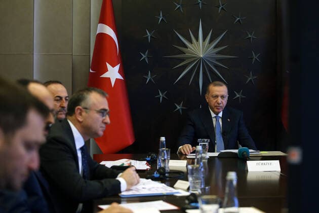 (200326) -- ISTANBUL, March 26, 2020 (Xinhua) -- Turkish President Recep Tayyip Erdogan (R) attends the G20 Extraordinary Virtual Leaders Summit on COVID-19 via video link in Istanbul, Turkey, on March 26, 2020. Turkish President Recep Tayyip Erdogan on Thursday urged the world countries to exert immediate joint efforts to combat the outbreak of the COVID-19, local media reported. (Xinhua) TURKEY-ISTANBUL-ERDOGAN-G20-COVID-19 