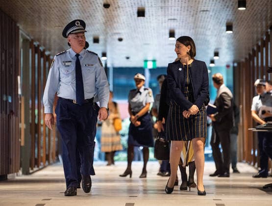 GLADYS BEREJIKLIAN CORONAVIRUS PRESSER, NSW Police Commissioner Mick Fuller and NSW Premier Gladys Berejiklian arriving at a press conference in Sydney, Friday, March 27, 2020. ( NO ARCHIVING, EDITORIAL USE ONLY, NO USE IN BOOKS WITHOUT CONSENT SYDNEY NSW AUSTRALIA  Copyright: xJAMESxGOURLEYx 20200327001460361308