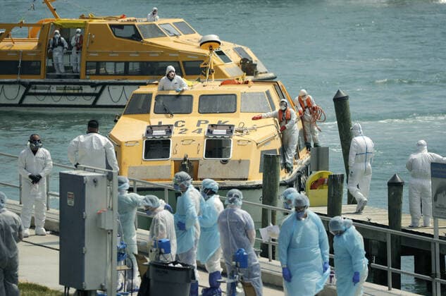 March 26, 2020, Miami Beach, FL, USA: Costa Favolosa cruise ship lifeboats arrive with crew members showing COVID-19 symptoms at the US Coast Guard Station Miami Beach on Thursday, March 26, 2020. Miami Beach USA - ZUMAm67_ 20200326_zaf_m67_015 Copyright: xDavidxSantiagox