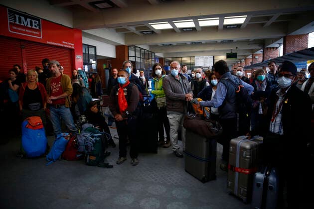 March 27, 2020, Kathmandu, Nepal: Tourists from Germany whom were stranded due to the lockdown imposed by the government amid concerns on the spread of coronavirus wait for their chartered flight back to Germany at Tribhuvan International Airport in Kathmandu, Nepal on Friday, March 27, 2020. Kathmandu Nepal - ZUMAg200 20200327_zap_g200_006 Copyright: xSkandaxGautamx