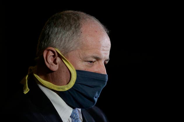 Deputy Health Minister and Central Crisis Staff head Roman Prymula with a protection face mask attends a press conference after meeting of Central Crisis Staff on COVID-19 illness, on March 26, 2020, in Prague, Czech Republic. (CTKxPhoto KaterinaxSulova) CTKPhotoP202003260912901 _SUK3834