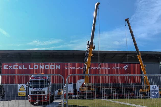 Equipment is seen outside the ExCell Center in London, Thursday, March 26, 2020. The British Government announced Tuesday, that the ExCel Center in east London will become a 4,000-bed temporary hospital to deal with future coronavirus patients. It will be called NHS Nightingale Hospital. (Photo Vudi Xhymshiti) 