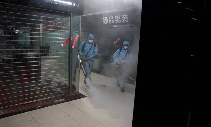 (200327) -- WUHAN, March 27, 2020 -- Staff members disinfect a shopping mall at the Hanzheng Street in Wuhan, central China s Hubei Province, March 27, 2020. The shopping mall was thoroughly cleaned and disinfected before resumption of business. ) CHINA-HUBEI-WUHAN-SHOPPING MALL-DISINFECTION (CN) WangxYuguo 