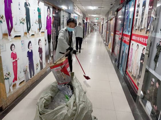(200327) -- WUHAN, March 27, 2020 -- A staff member cleans a shopping mall at the Hanzheng Street in Wuhan, central China s Hubei Province, March 27, 2020. The shopping mall was thoroughly cleaned and disinfected before resumption of business. ) CHINA-HUBEI-WUHAN-SHOPPING MALL-DISINFECTION (CN) WangxYuguo 